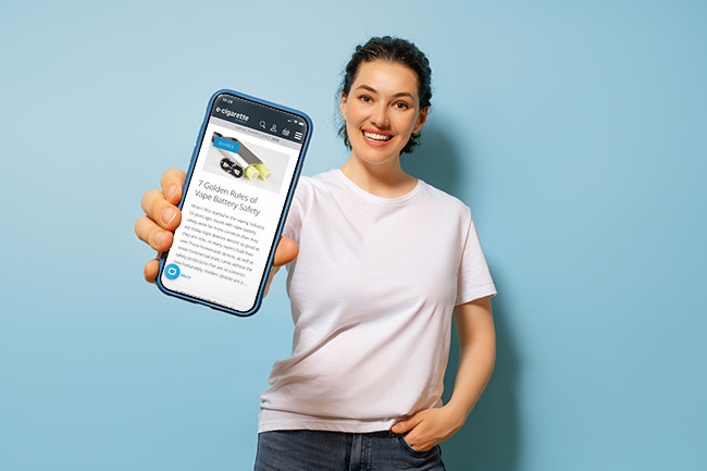 Image of a woman holding a mobile phone displaying the ECD website